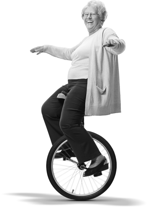 Senior citizen riding a unicycle